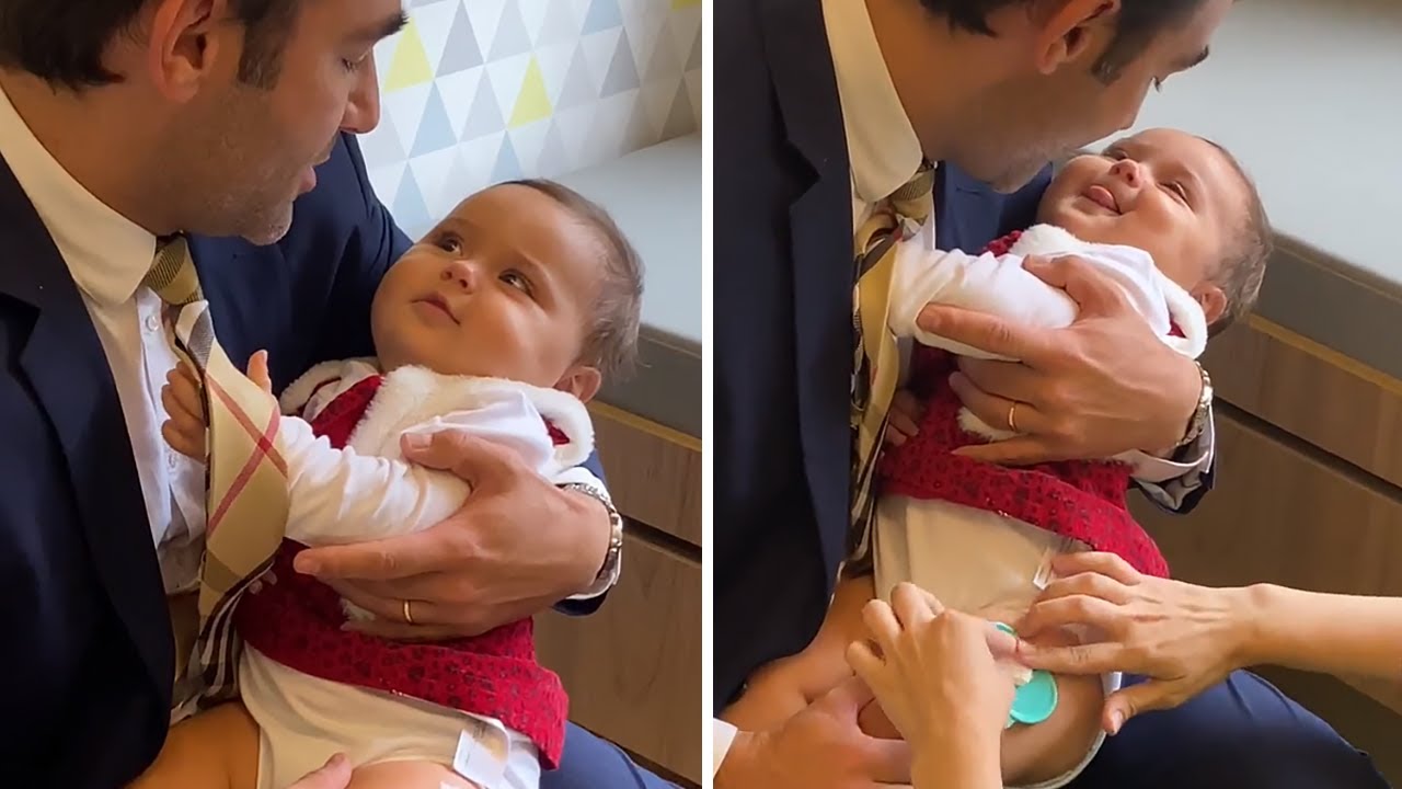 Dad adorably distracts baby during doctor’s visit